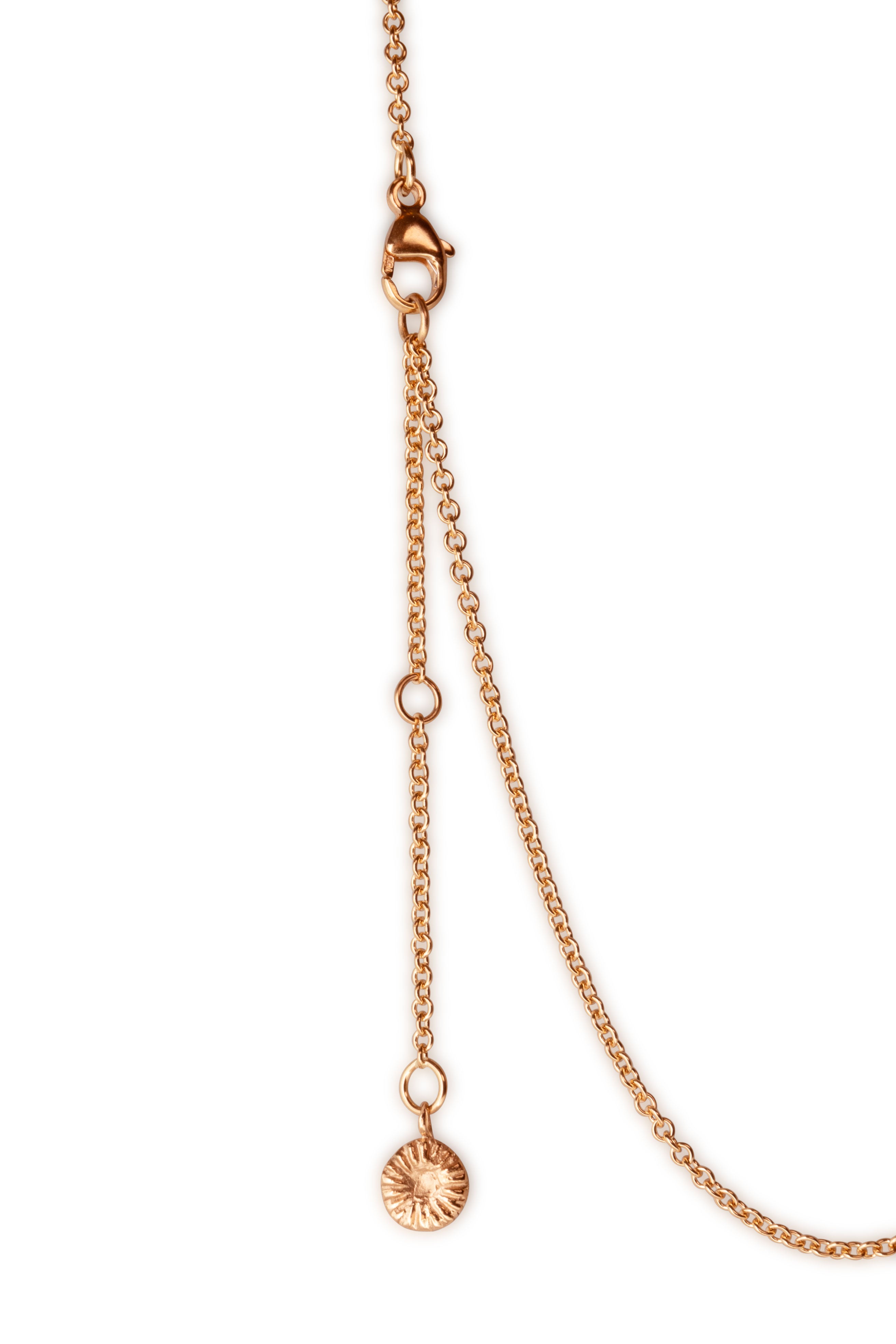 Knappkorall halsband i guld närbild